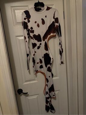 Cow print cutout dress with orange trim